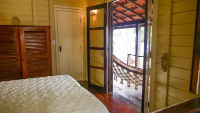 Uma cama ou camas num quarto em CASA MIRAGE lagoa