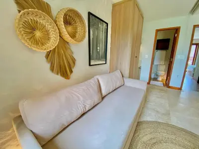 Uma área de estar em Taíba Beach Resort por Be My Guest!