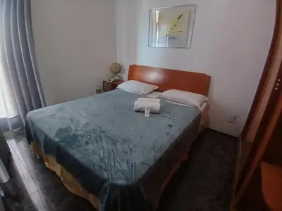 Uma cama ou camas num quarto em Flat Brasil Tropical Meireles by Escala