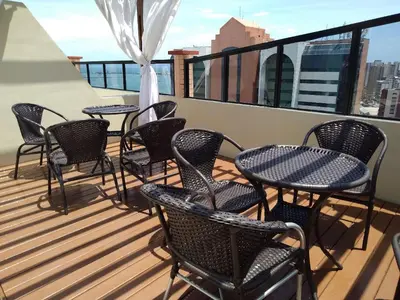 Uma varanda ou terraço em Flat Brasil Tropical Meireles by Escala
