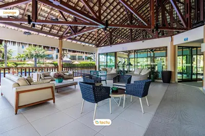 Uma área de estar em Térreo próximo da Piscina e Praia no VG Sun