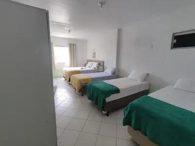 Uma cama ou camas num quarto em Amazônia Praia Hotel