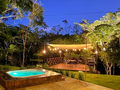 A piscina em ou perto de Chalé Novo - 4 quartos - 12 camas - Hidromassagem e Ar condicionado nos quartos - Cond Montserrat