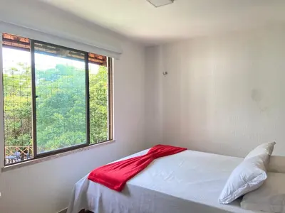 Uma cama ou camas num quarto em Chalé Novo - 4 quartos - 12 camas - Hidromassagem e Ar condicionado nos quartos - Cond Montserrat