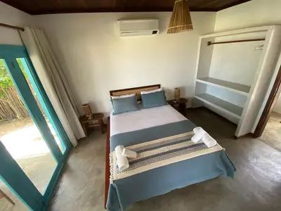 Uma cama ou camas num quarto em Casa Vento