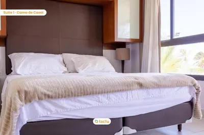 Uma cama ou camas num quarto em Bangalô vista mar VG Sun Cumbuco por Tactu