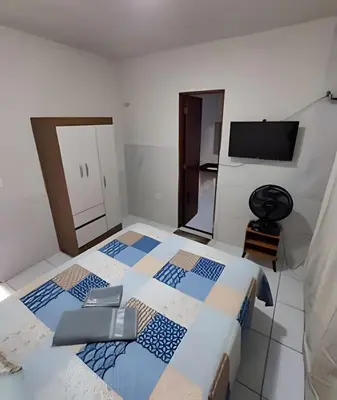 Uma cama ou camas num quarto em Apartamento acolhedor Maracanaú -Premium