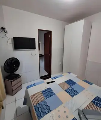 Uma cama ou camas num quarto em Apartamento acolhedor Maracanaú -Premium