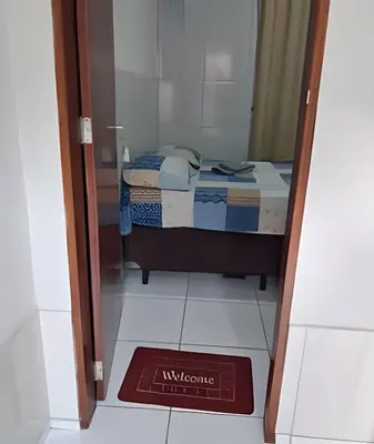 Uma cama ou camas num quarto em Apartamento acolhedor Maracanaú -Premium