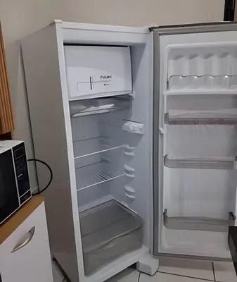 A cozinha ou kitchenette de Apartamento acolhedor Maracanaú -Premium