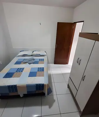 Uma cama ou camas num quarto em Apartamento acolhedor Maracanaú -Premium