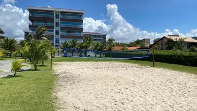 A piscina em ou perto de Apto vista mar e pé na areia no Beach Way a 300m do Beach Park
